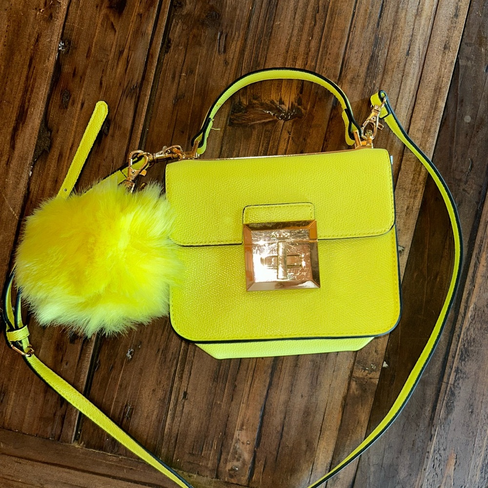 Aldo Yellow Crossbody Bag with Gold Clasp and Smooth Finish